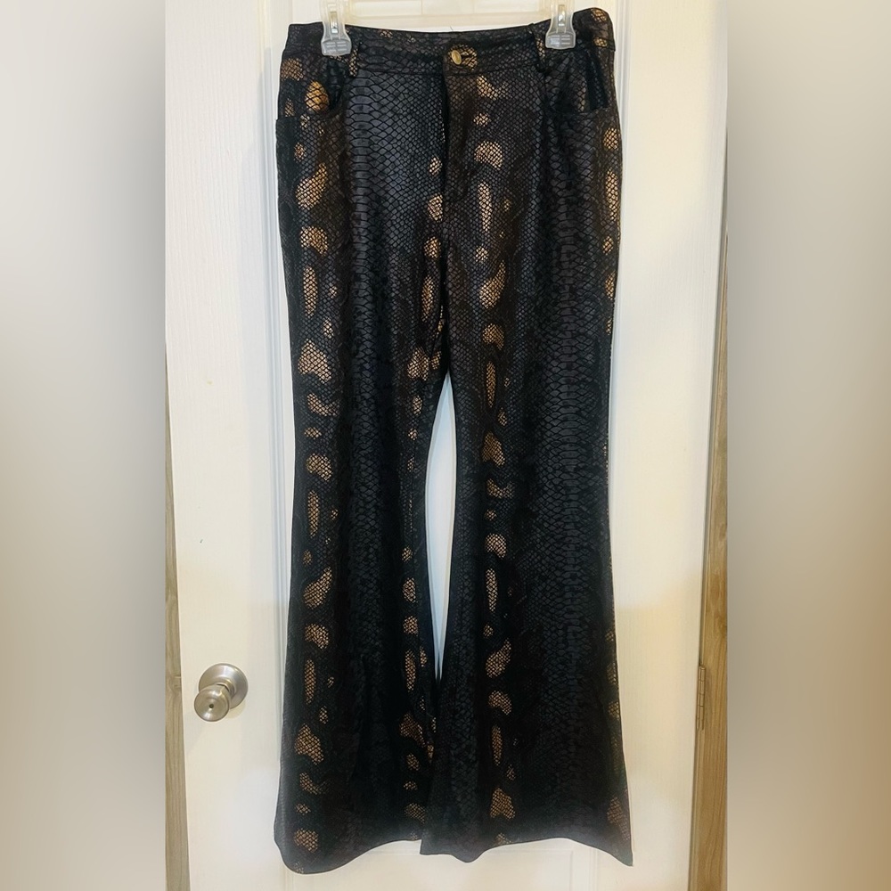 Faux leather /Snakeskin pants from Blessed Buffalo Boutique.